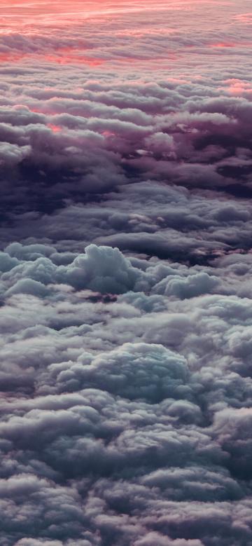 九千米高空下的斑斓云彩手机壁纸