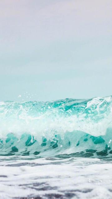 海面上卷起浪花手机壁纸