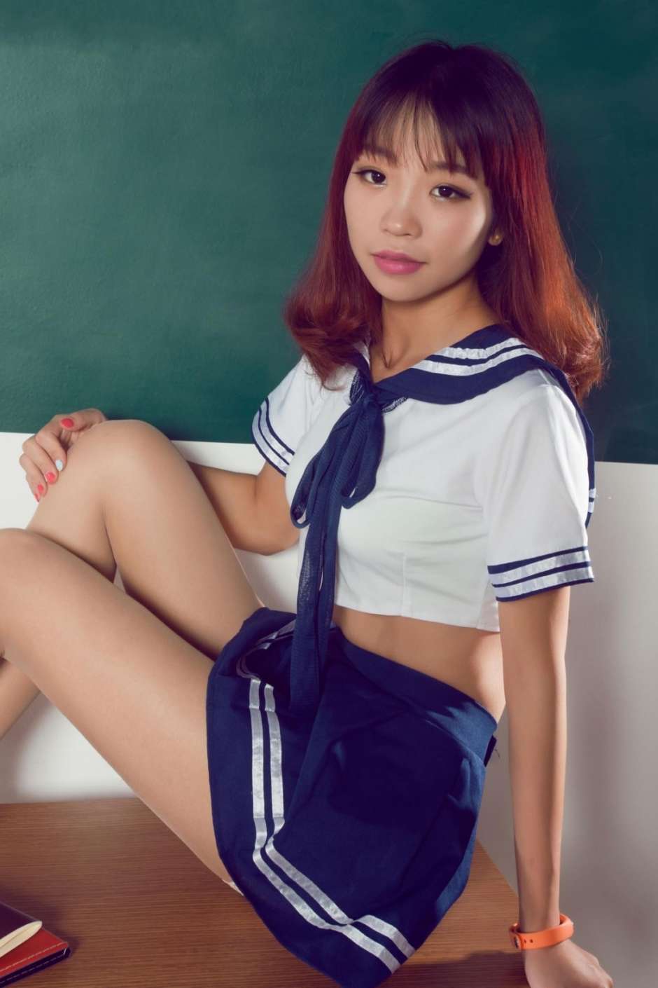 丽柜美腿模特蓝色学生制服肉丝美腿写真